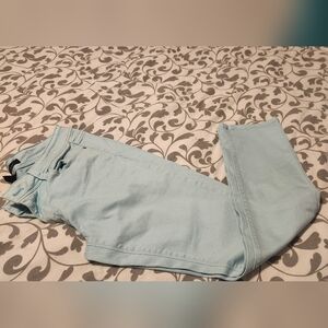Mid rise aqua jeans.